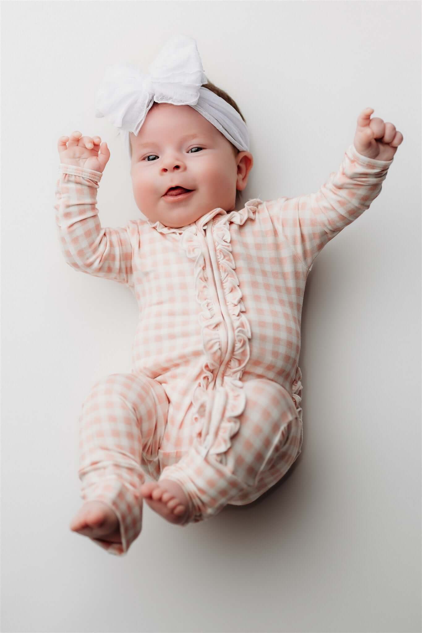 Olivia Ruffle Zip Footie